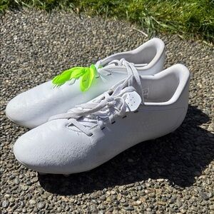 Adidas women’s White Athletic Cleats size 9 with Neon Green Accent